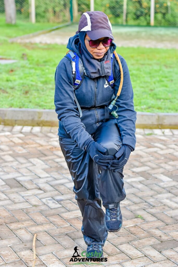 Jane Gatonye warming up for a day Hike with Cushy Adventures Team