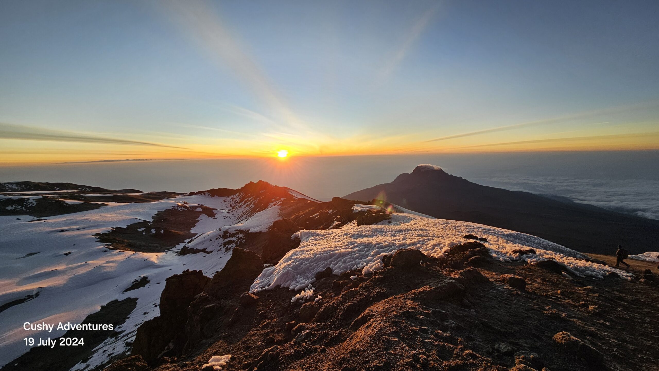 Sunrise near Stella Point on Mt. Kilimanjaro during summit approach