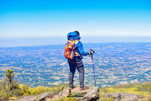 Hiker standing on Table Mountain trail during the Seven Ponds Traverse in the Aberdares