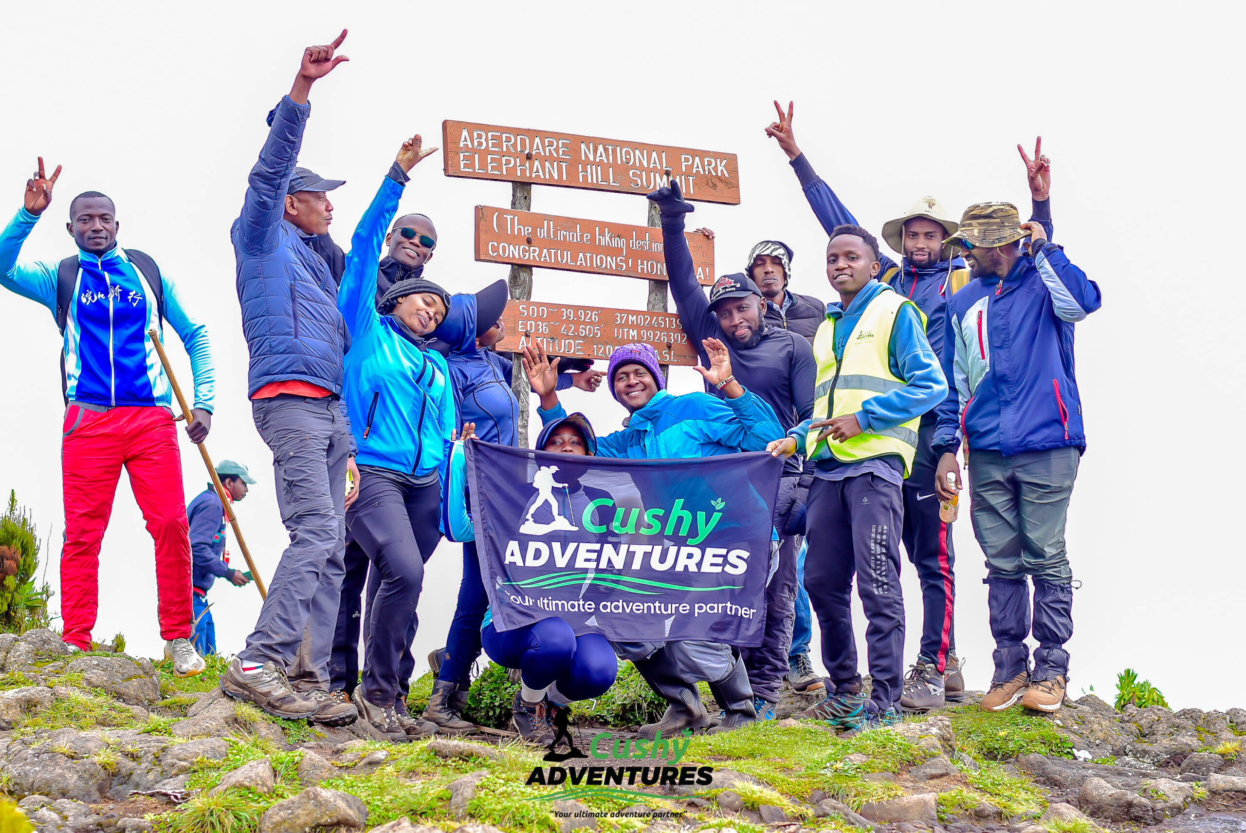 Cushy Adventures hikers celebrating at the summit of Table Mountain
