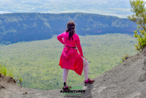 Young hiker pausing near Kilele Ngamia summit