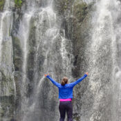 Scenic Ragia waterfall flowing through the Aberdare forest trail